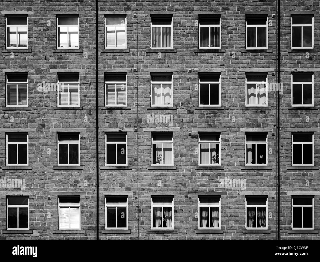 Lots of windows in apartment building Stock Photo