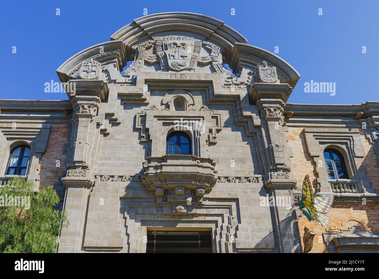 Facade of the Pavilion of Peru with a wooden balcony in the city of Seville, in Spain Stock Photo