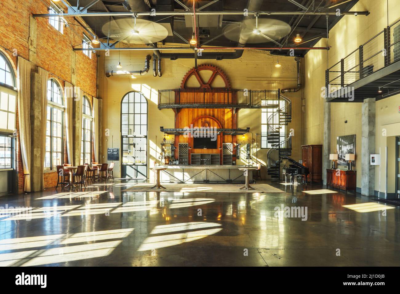 The Steam Plant. Interior of a restored historical utility building now used for events. Includes a view of the bar at then end of the room. The Steam Stock Photo
