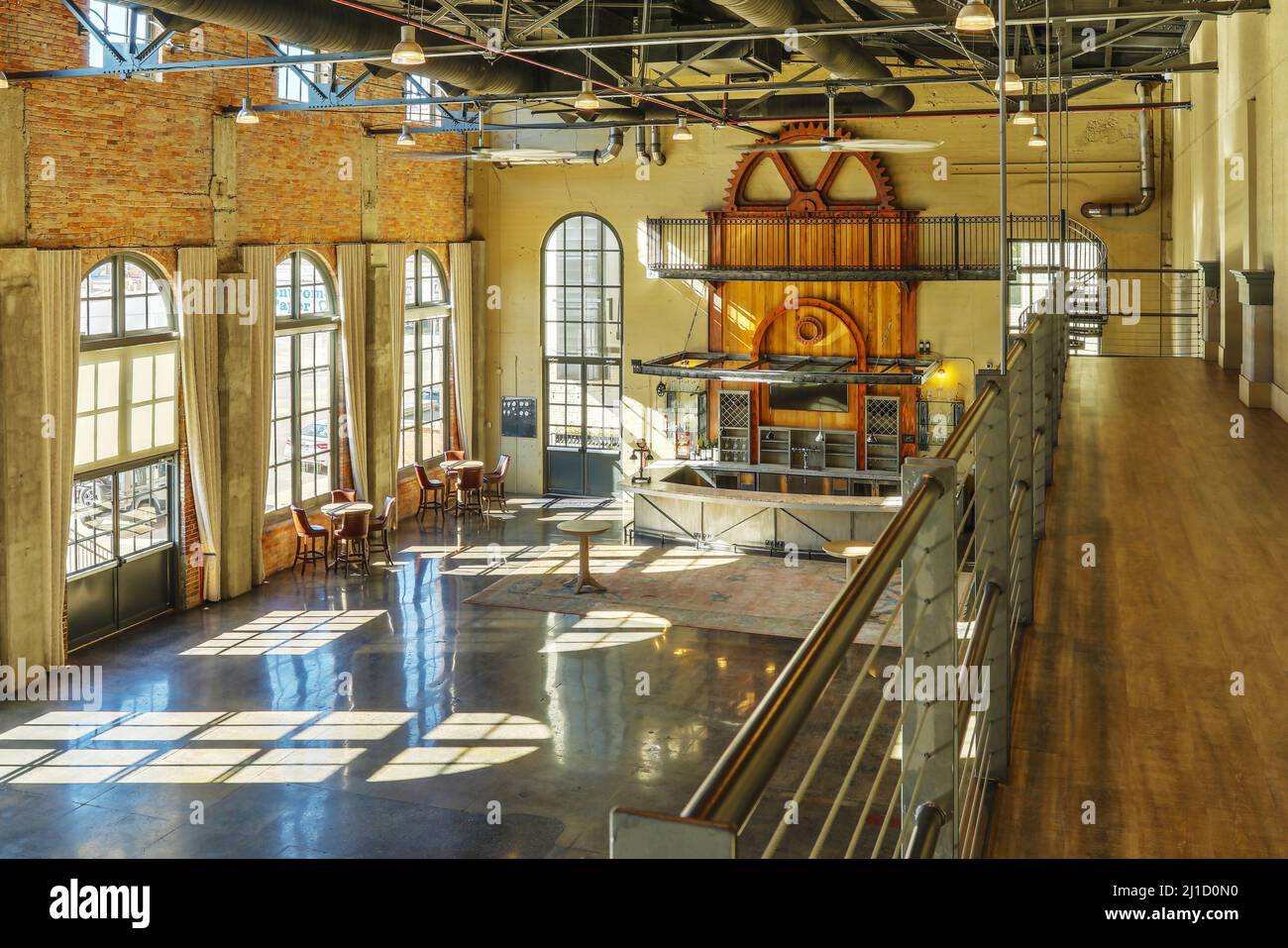 The Steam Plant. Interior of a restored historical utility building now used for events. Includes a view of the bar at then end of the room. The Steam Stock Photo