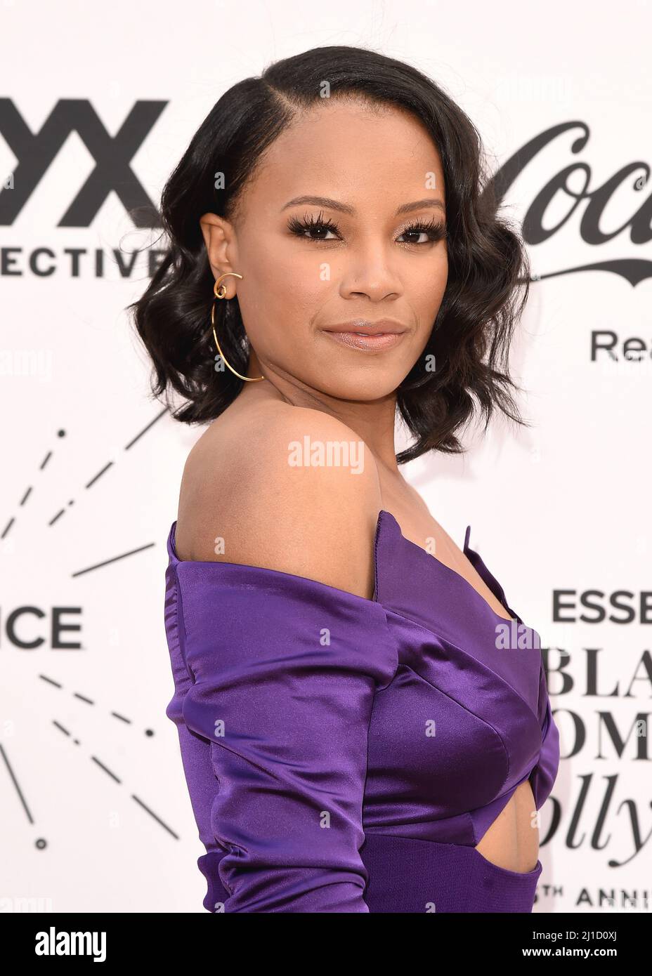 Chante Adams walking on the red carpet at Essence 15th Annual Black