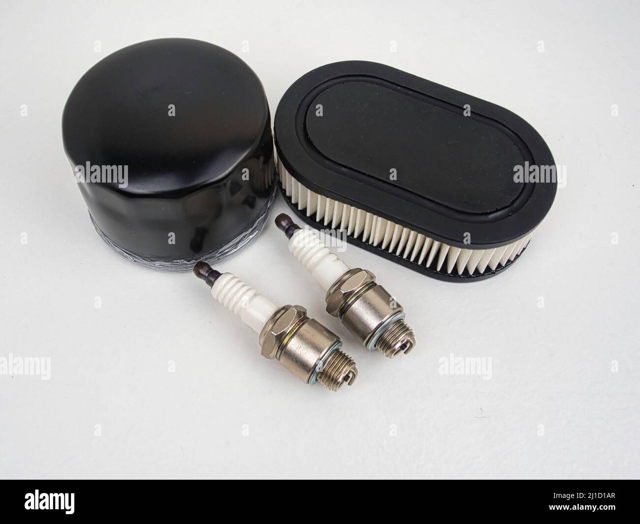 Spring tune up parts for a small mower engine Stock Photo Alamy
