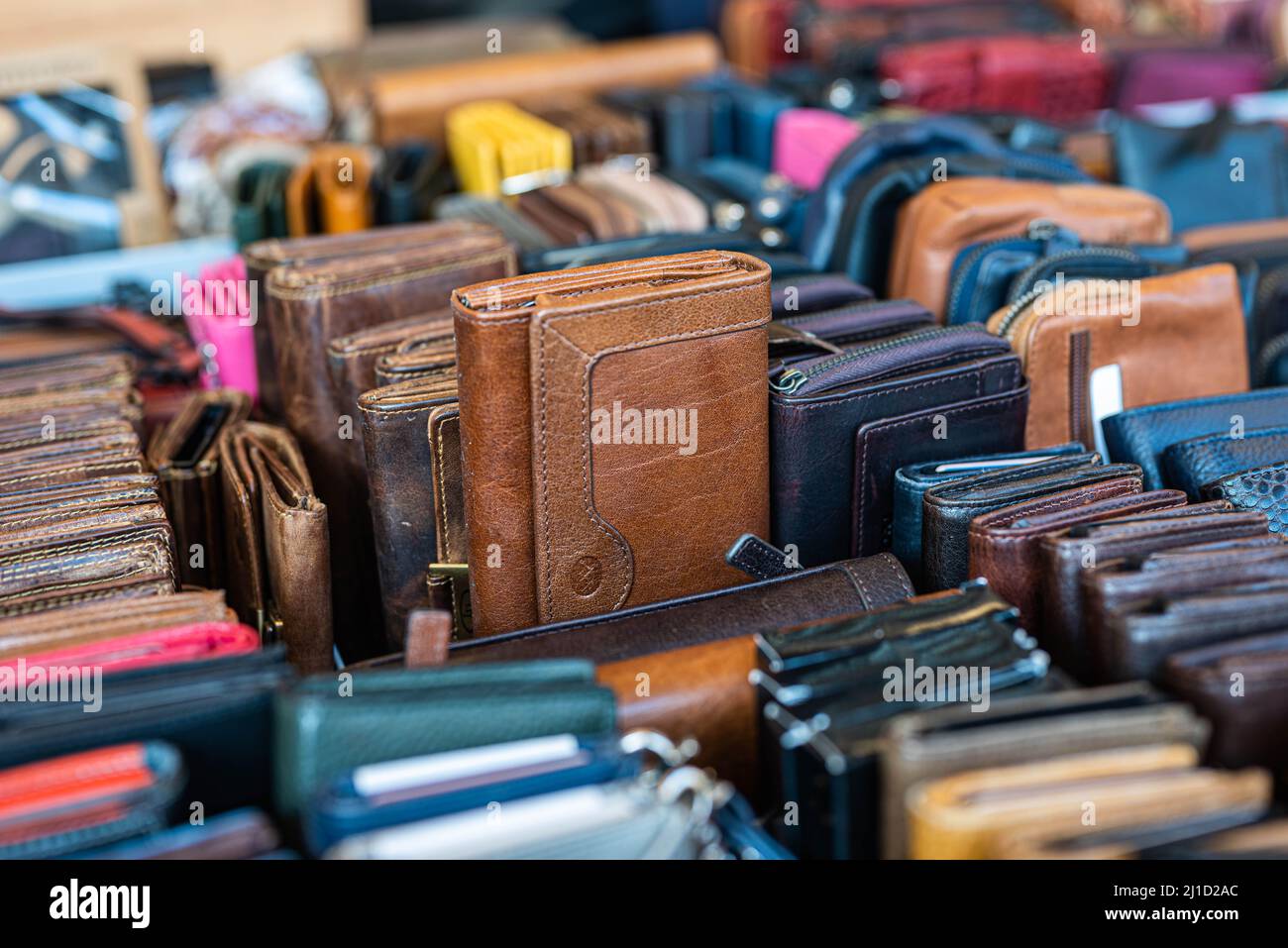 phone cases are sold in a crate on a street market in a market stall Stock Photo