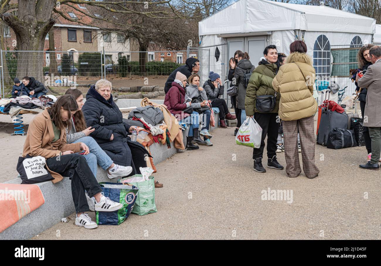 Brussels, Belgium - March 24, 2022: Refugees from Ukraine outside an immigration office Stock Photo