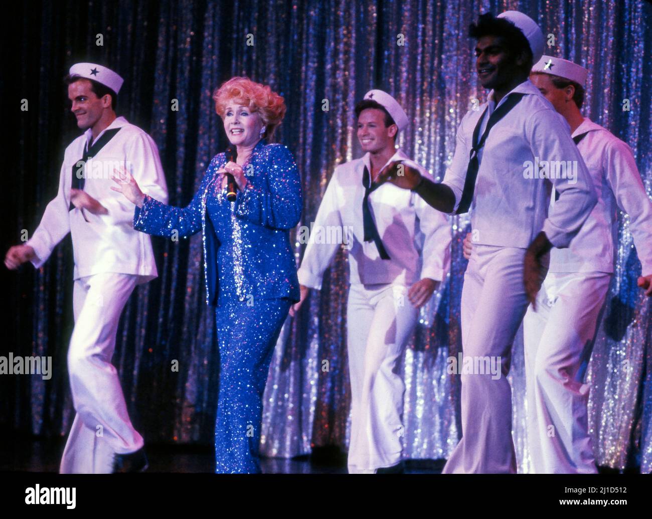 Debbie Reynolds performing a song and dance number at the Thalians Ball in Beverly Hills, CA. Stock Photo