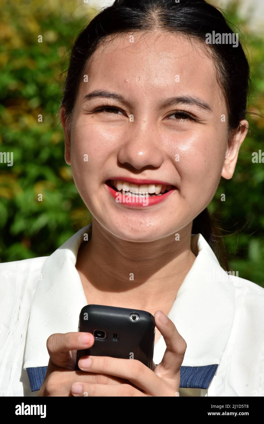 Attractive Asian Female And Happiness With Cell Phone Stock Photo
