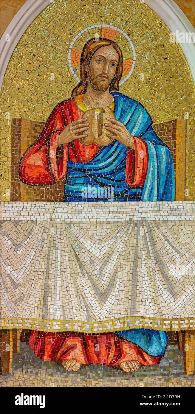 BARI, ITALY - MARCH 5, 2022: The mosaic of Jesus at the Breaking of Bread in the church Chiesa del Redentore from year 1969. Stock Photo