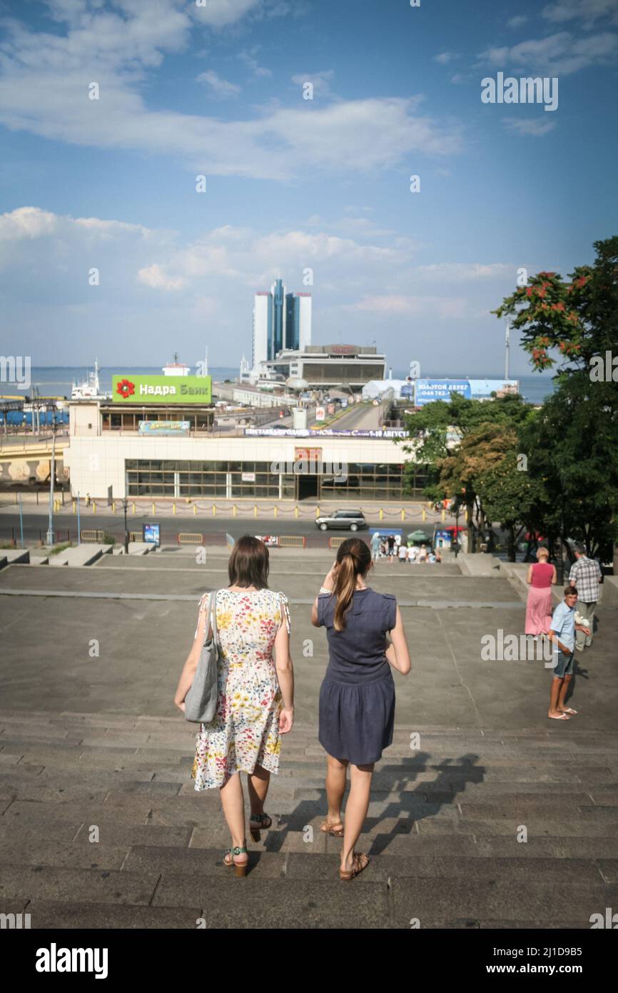 Picture of a two women at the top of Potemkin stairs going down the steps, one of the symbols of the city of odessa, ukraine, on the black sea. The Po Stock Photo