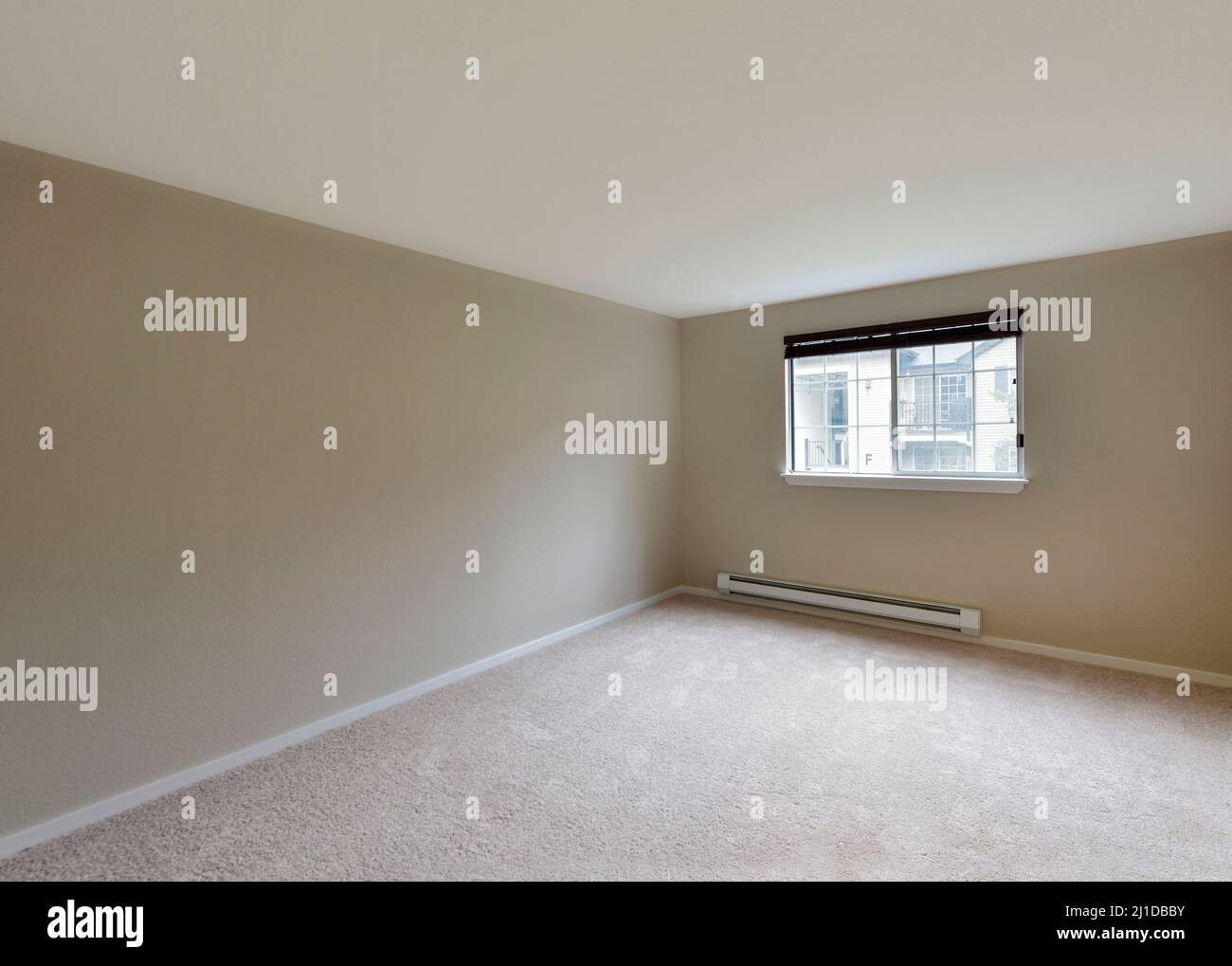 Modern residential empty bedroom interior Stock Photo - Alamy