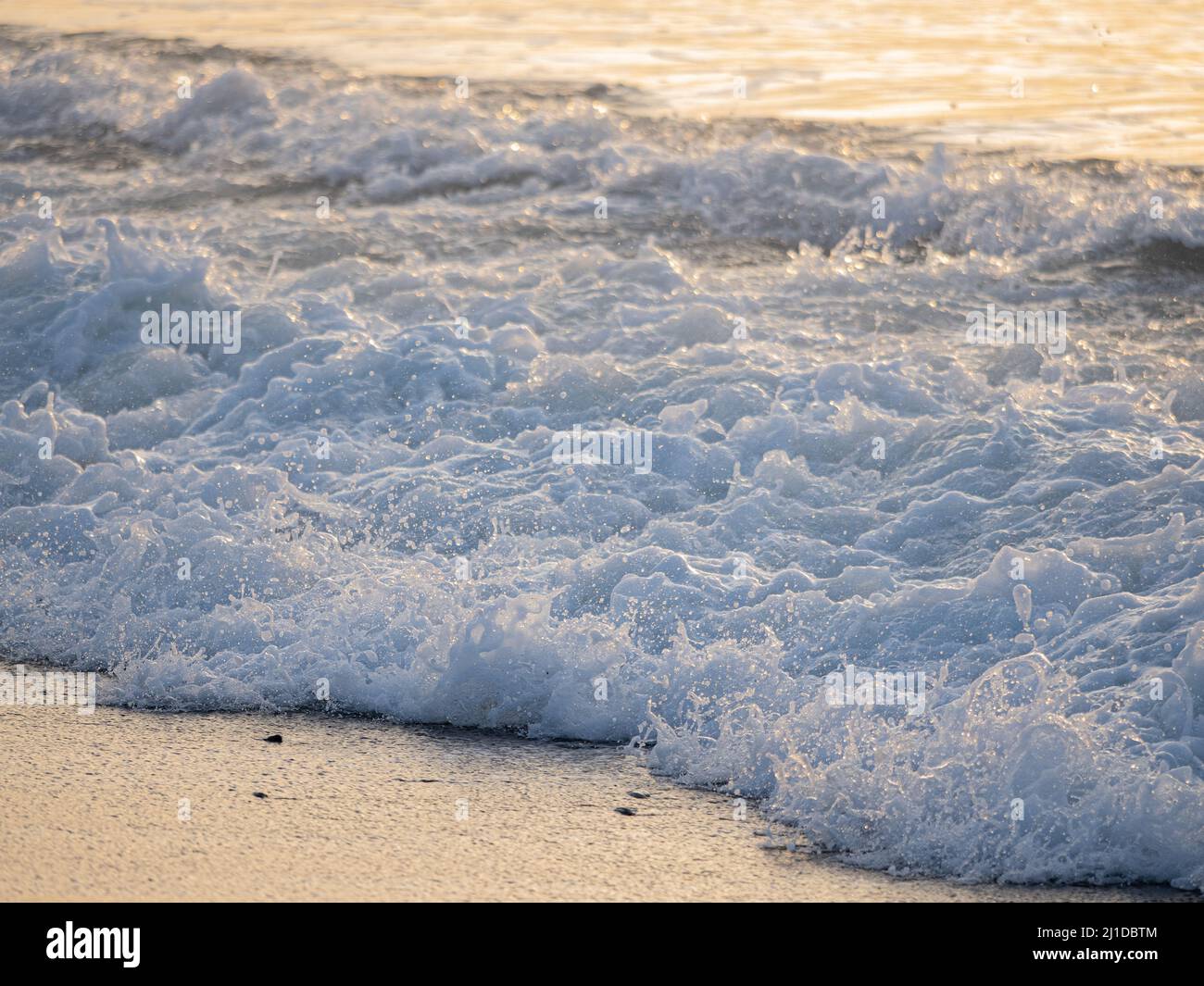 Ocean beach sunrise splashing sea hi-res stock photography and images ...