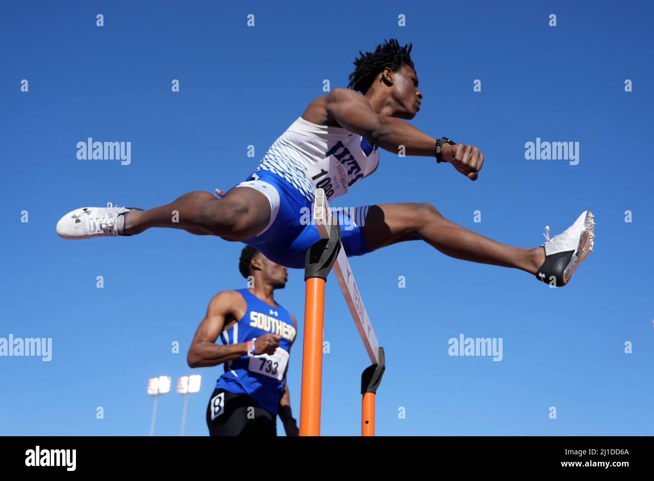 Jaden Williams of Western Texas runs in a 400m hurdles heat during the 94th Clyde Littlefield