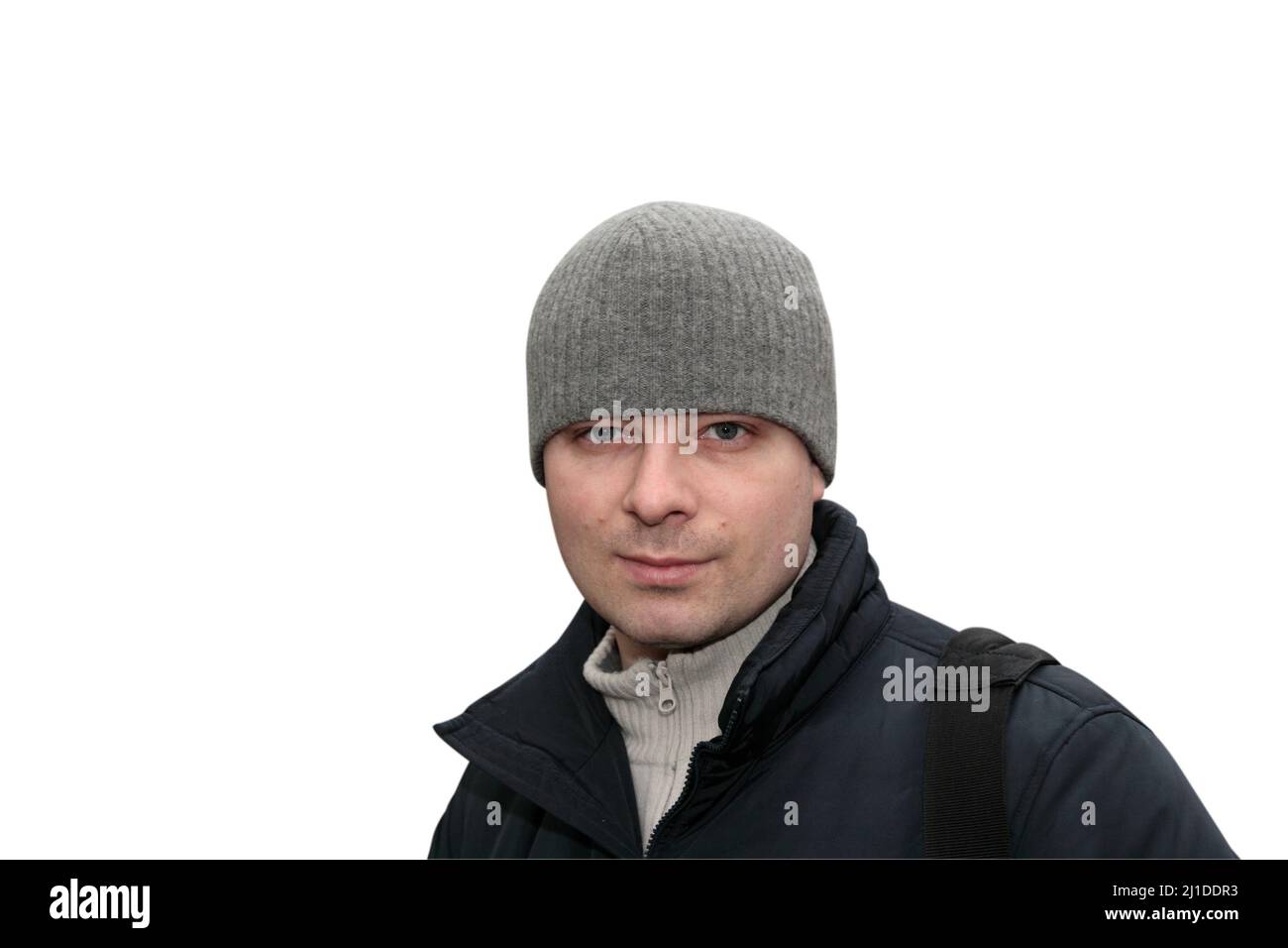 The man poses in winter clothes, isolated on white Stock Photo - Alamy