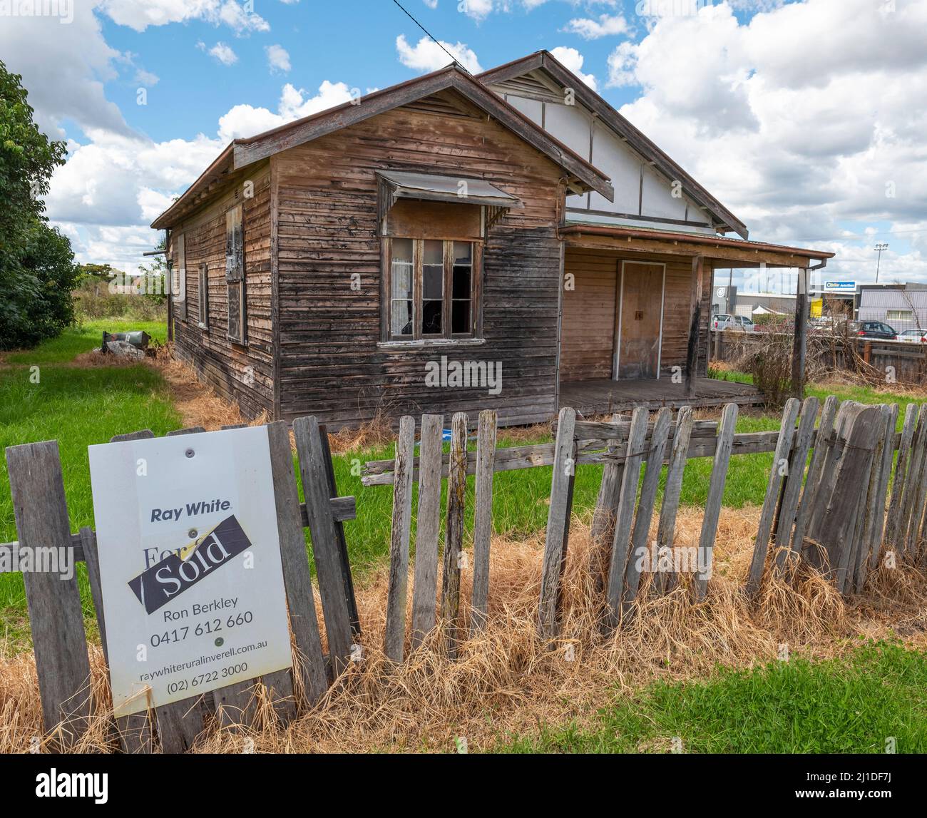 Dilapidated house in Inverell with sold sign out the front, shows that