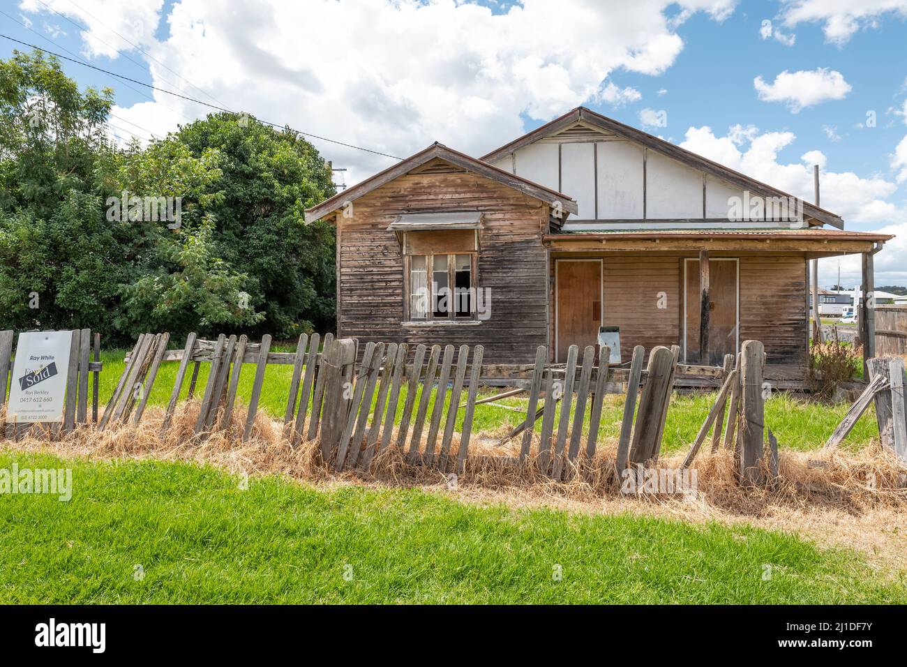 Dilapidated house in Inverell with sold sign out the front, shows that