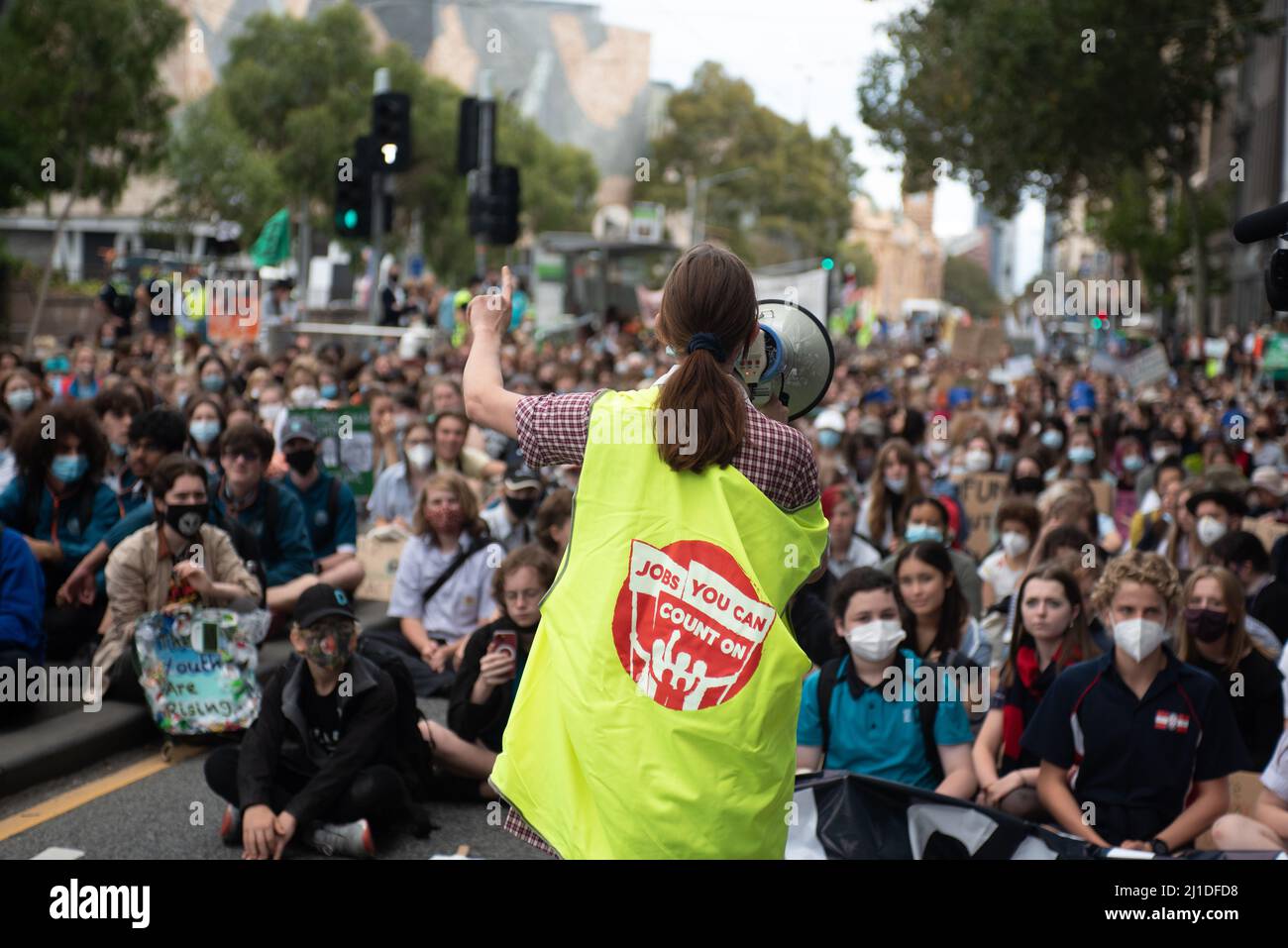 Melbourne, Australia. 25th March 2022. School students march through Melbourne to protest against Australian political inaction on climate change. Credit: Jay Kogler/Alamy Live News Stock Photo