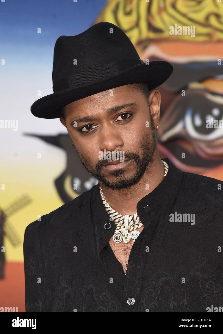 Los Angeles, USA. 24th Mar, 2022. LaKeith Stanfield walking on the red carpet at the red carpet