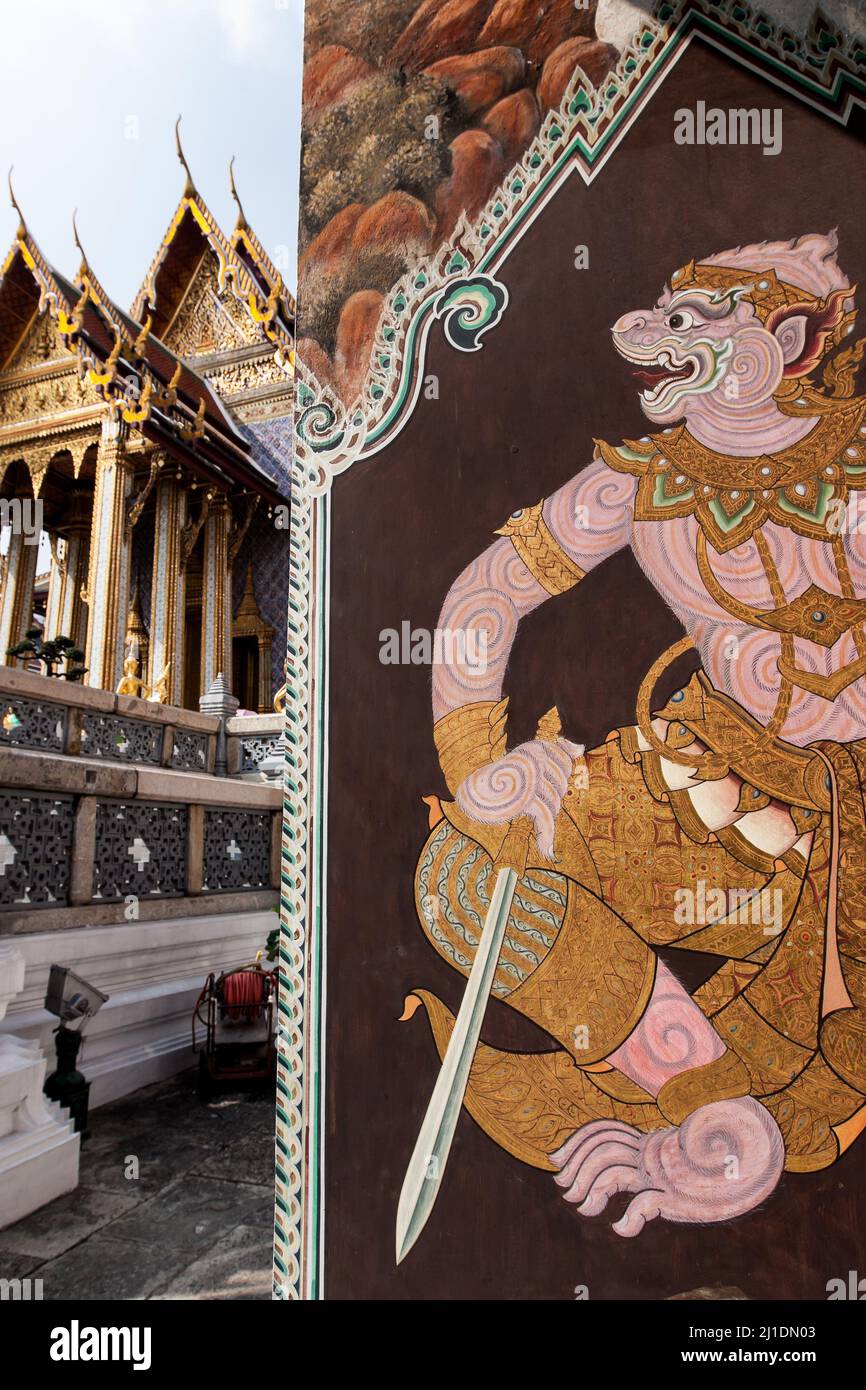 Art painting on the wall of the ancient temple at Wat Phra Kaew or The Grand Palace, Temple of the Emerald Buddha, tourist attractions in Thailand. Stock Photo