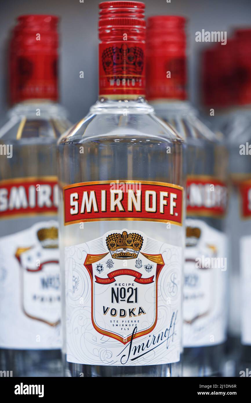 Russian vodka. Bottles of Smirnoff vodka on a shelf in duty free shop