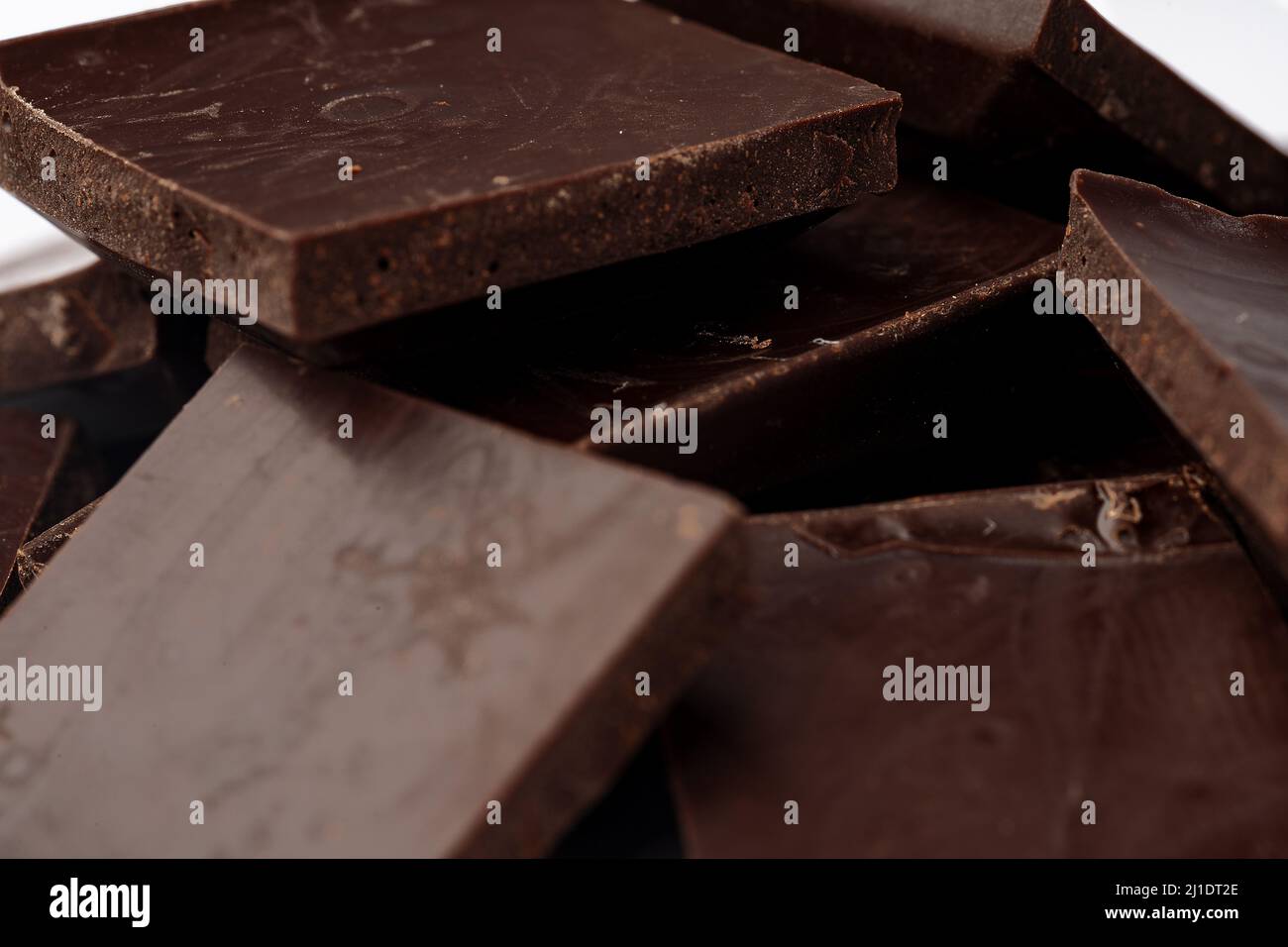 Milk chocolate bars stack for background, close up Stock Photo - Alamy