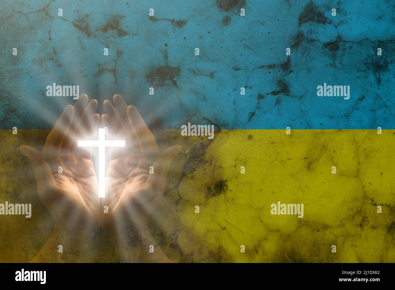 Hands in prayer. Prayer for Ukraine. Ukrainian flag. Prayer for the