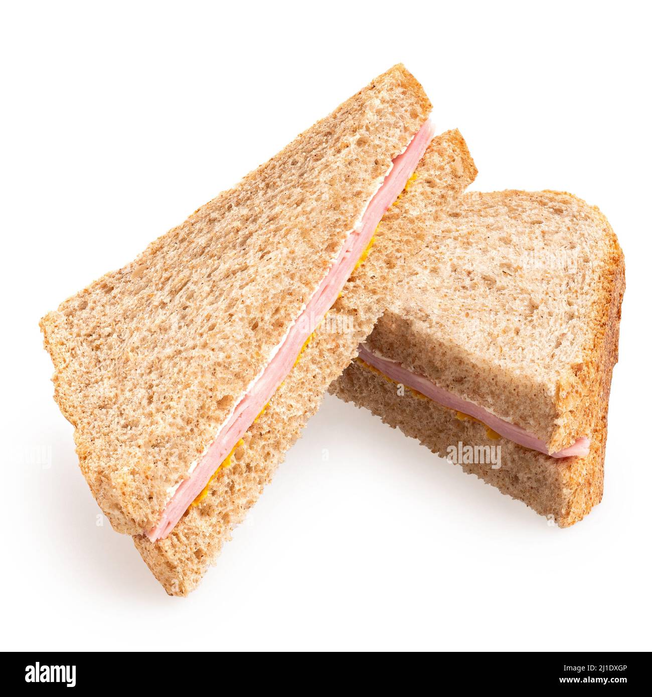 Two ham and mustard wholewheat triangle sandwiches isolated on white