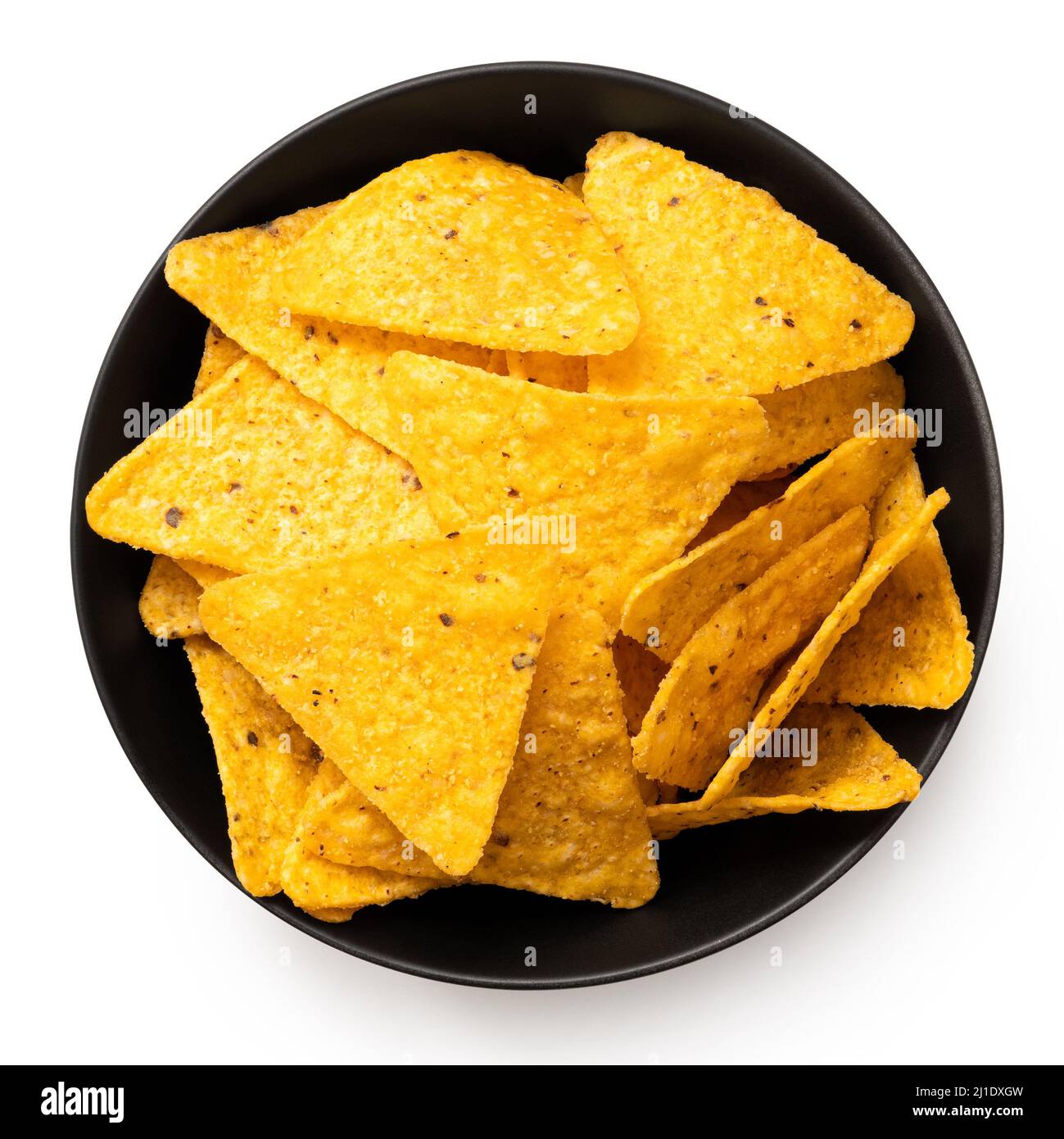 Tortilla chips in a black ceramic bowl isolated on white. Top view