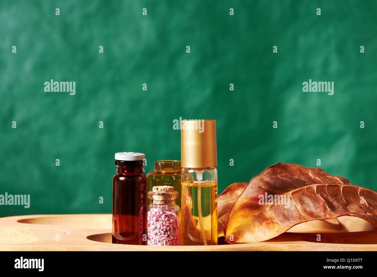 Gift cosmetic set with perfume liquids and oils on the display in the