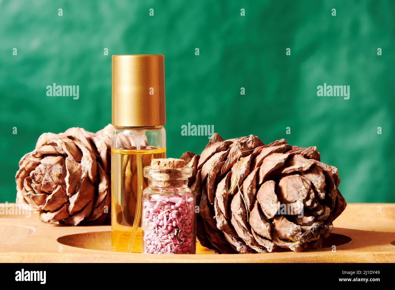 Perfume jar and decorative vial with scented petals on the beauty shop display. Fashion and beauty backgrounds and templates Stock Photo