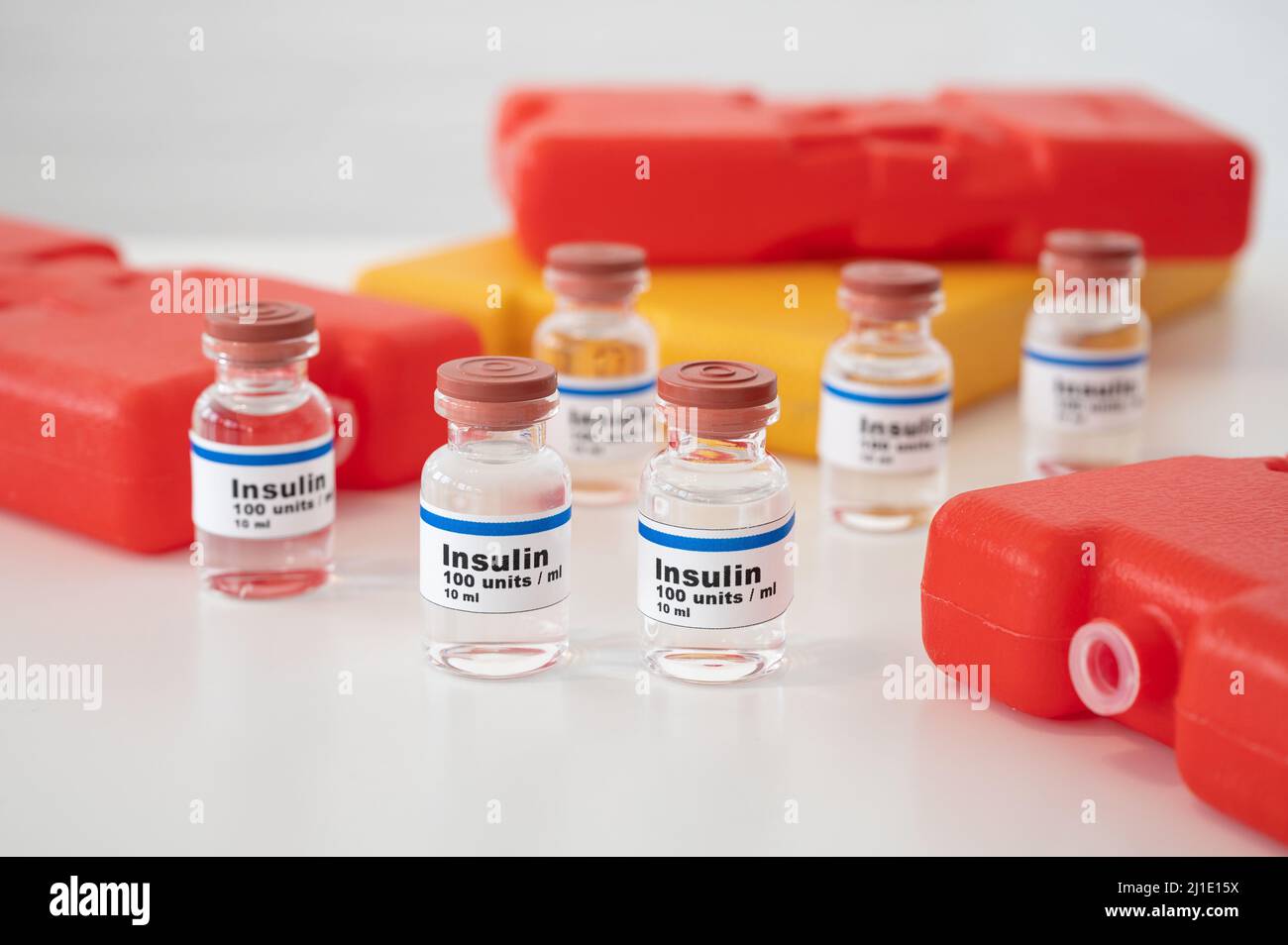 Insulin ampoules with cold packs against a white background properly cooling and storing