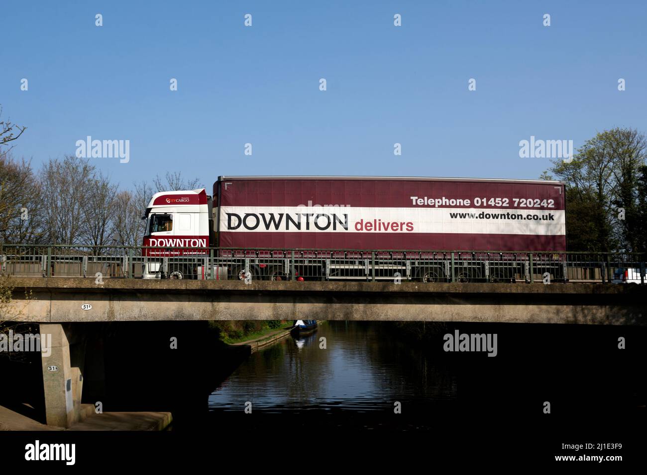 Downton lorry on the A46 road passing over the Grand Union Canal, Warwick, UK Stock Photo