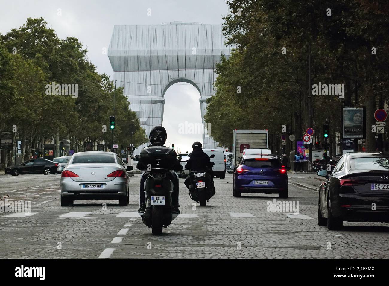 02.10.2021, France, , Paris - the wrapped Arc de Triomphe. The idea, born in 1962 by the artists Christo and Jeanne-Claude, has now been posthumously Stock Photo