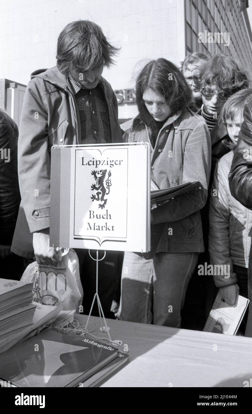 25.04.1979, GDR, Leipzig District, Leipzig - People at the 1st Leipzig book market. 00S790425D014CAROEX.JPG [MODEL RELEASE: NO, PROPERTY RELEASE: NO ( Stock Photo