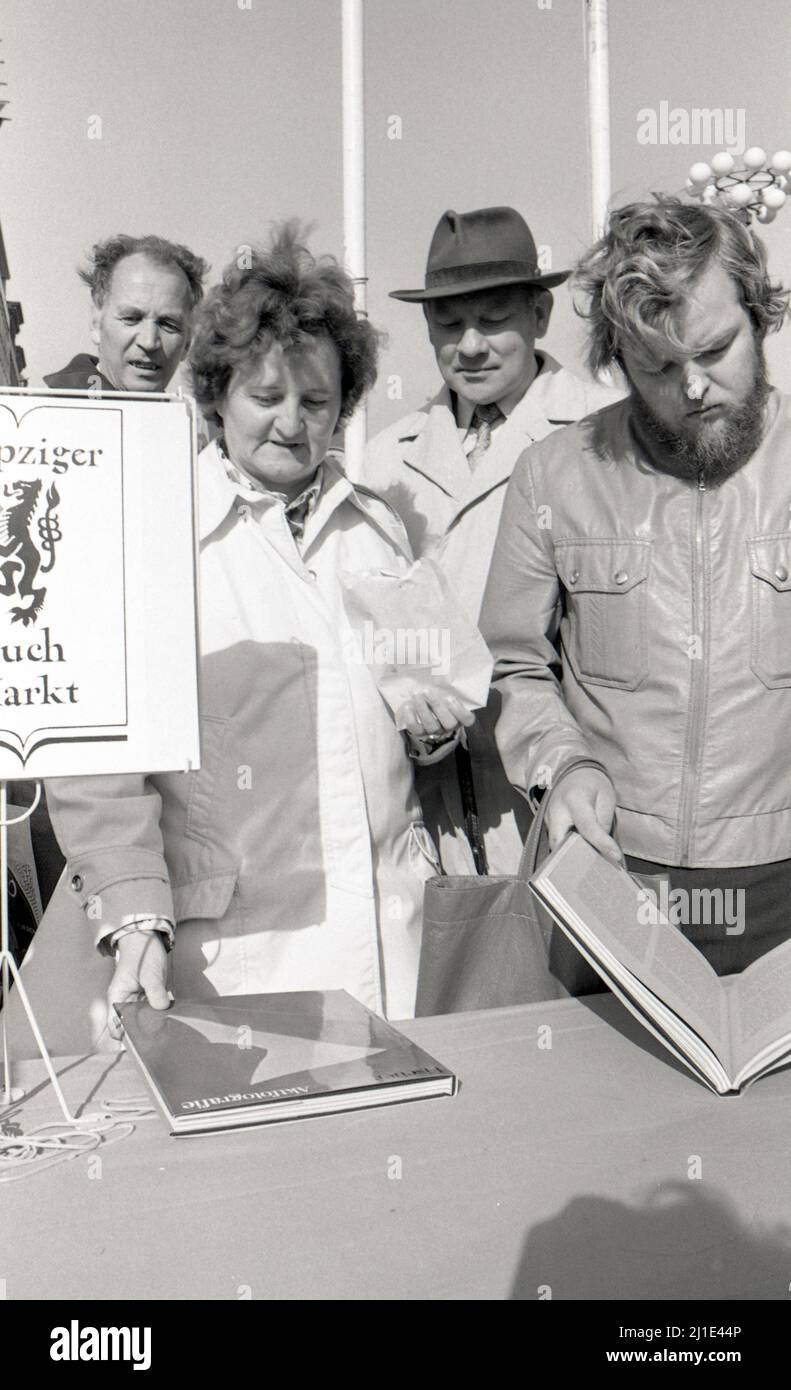 25.04.1979, GDR, Leipzig District, Leipzig - People at the 1st Leipzig book market. 00S790425D018CAROEX.JPG [MODEL RELEASE: NO, PROPERTY RELEASE: NO ( Stock Photo