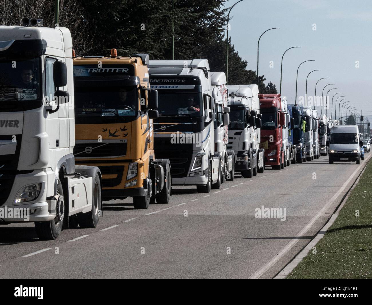 Burgos, Spain. 24th Mar, 2022. A line of trucks seen on Madrid-Irun Highway during the protest. Truckers join the transport strike as they pass through the city of Burgos. The strike is due to the rise in fuel prices and their working conditions, they have been paralyzing the country for a week. (Photo by Jorge Contreras Soto/SOPA Images/Sipa USA) Credit: Sipa USA/Alamy Live News Stock Photo