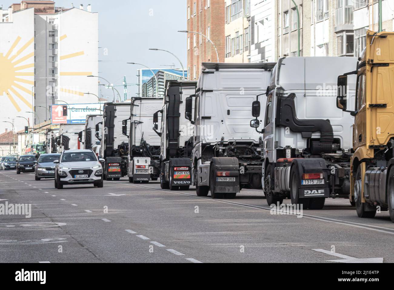 Burgos, Spain. 24th Mar, 2022. A line of trucks seen on Vitoria Street during the protest. Truckers join the transport strike as they pass through the city of Burgos. The strike is due to the rise in fuel prices and their working conditions, they have been paralyzing the country for a week. (Photo by Jorge Contreras Soto/SOPA Images/Sipa USA) Credit: Sipa USA/Alamy Live News Stock Photo
