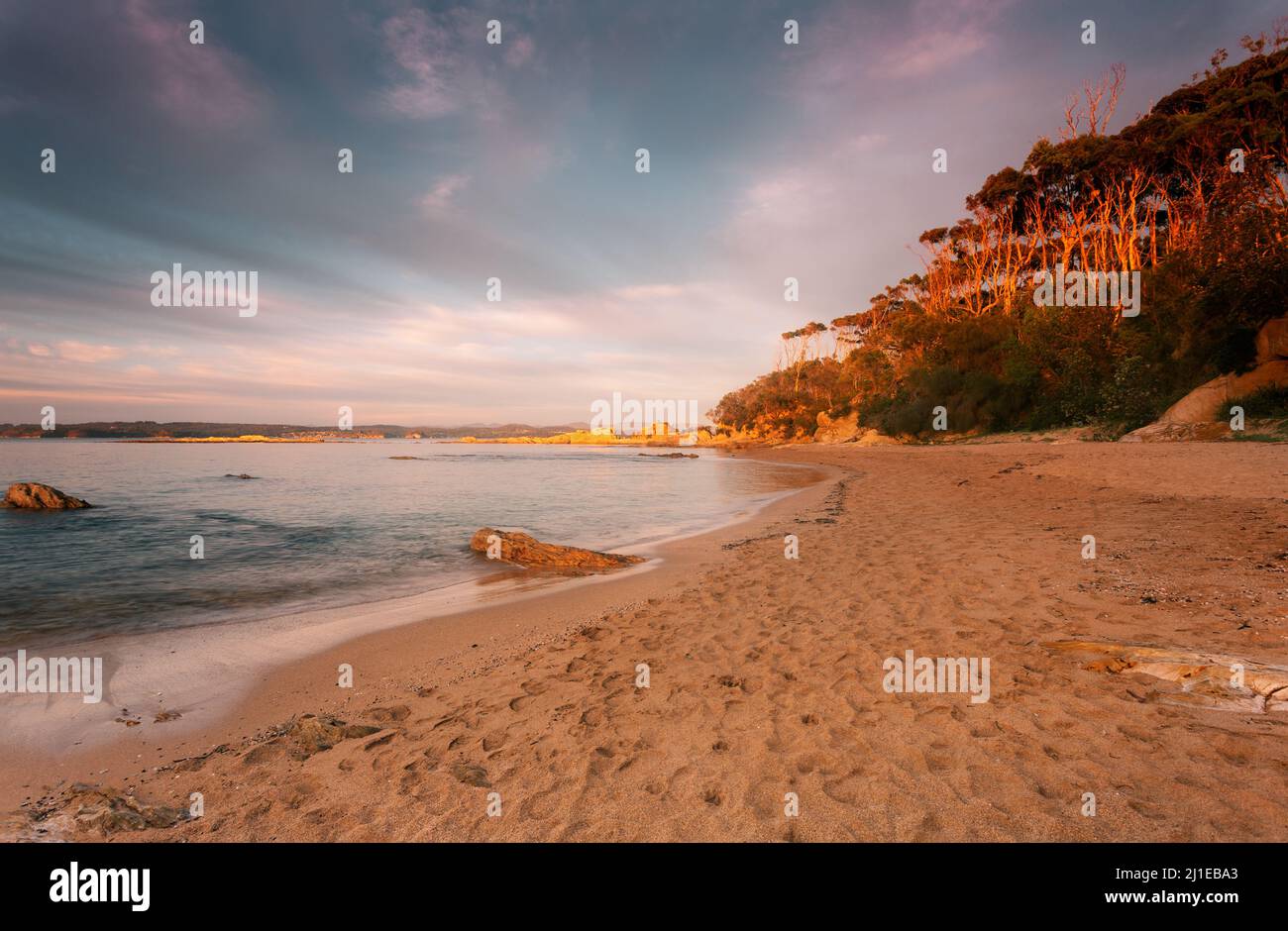 Morning light on the beach in holiday coast of Batemans Bay Stock Photo