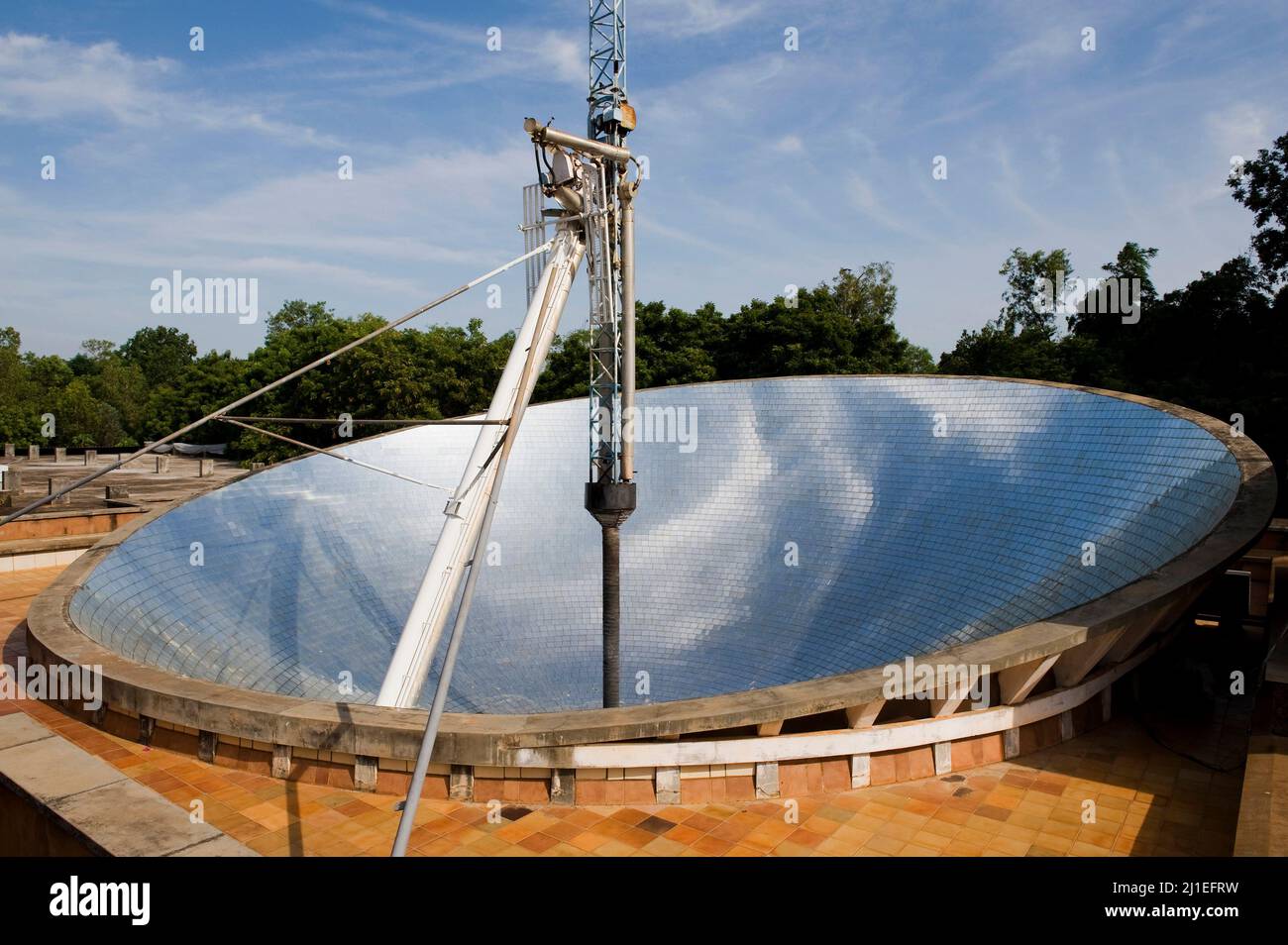 Auroville, India - August 2016: The Solar Bowl of the Solar Kitchen. It is 18 meters wide and helps to prepare lunch for more than 1000 meals per day. Stock Photo