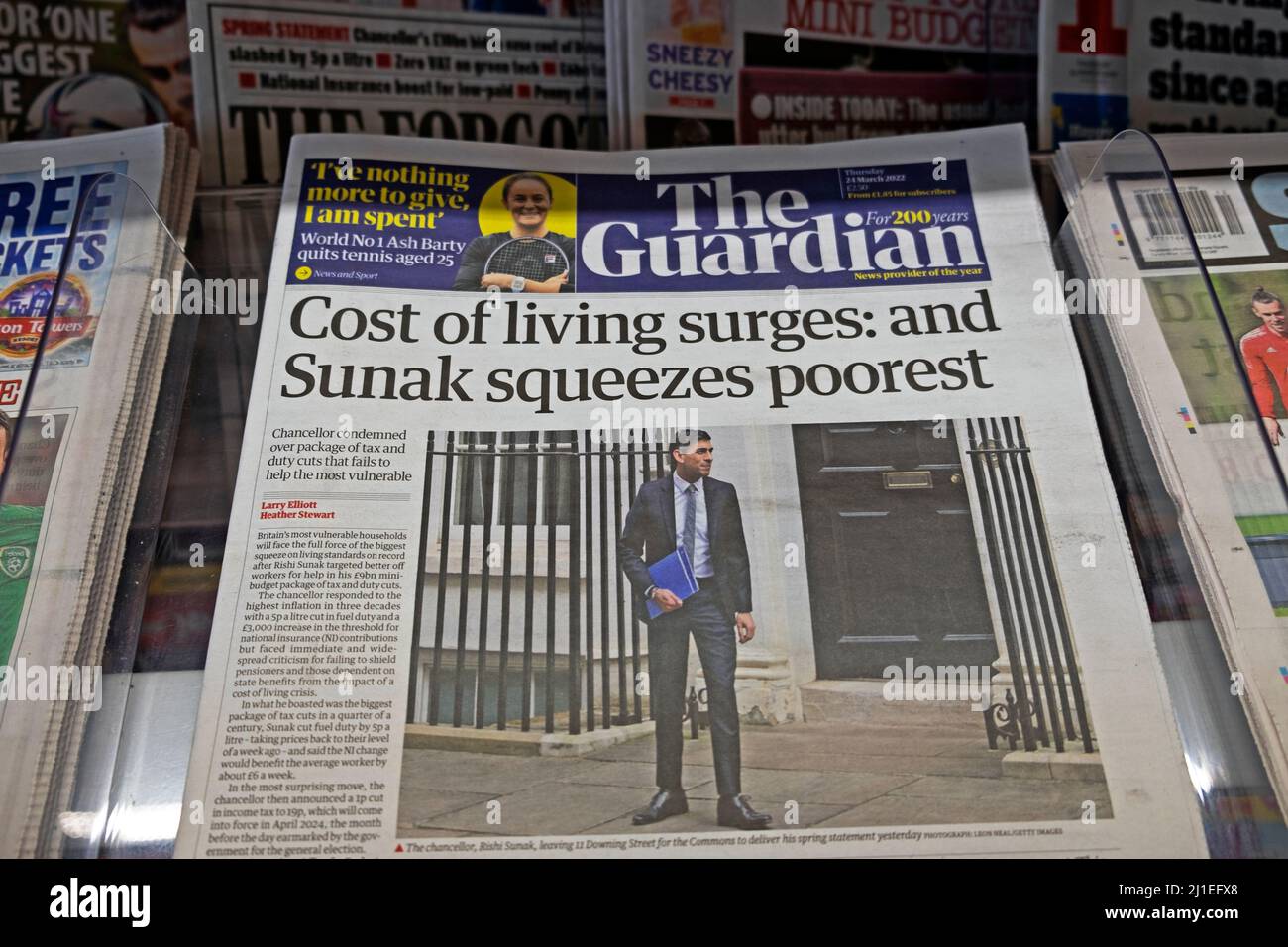 'Cost of living surges: and Sunak squeezes poorest' Rishi Sunak spring budget Guardian newspaper headline front page 24 March 2022 London UK Britain Stock Photo