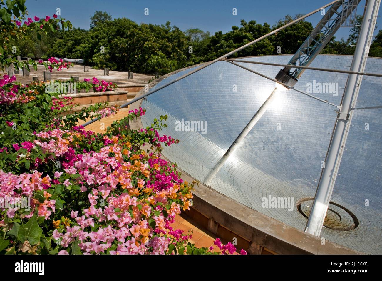 Auroville, India - August 2016: The Solar Bowl of the Solar Kitchen. It is 18 meters wide and helps to prepare lunch for more than 1000 meals per day. Stock Photo