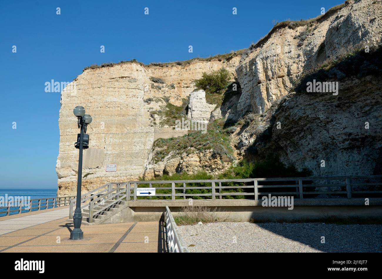 Famous cliffs of Etretat with the staircase that gives access to the upstream (Amont in french) cliff Stock Photo