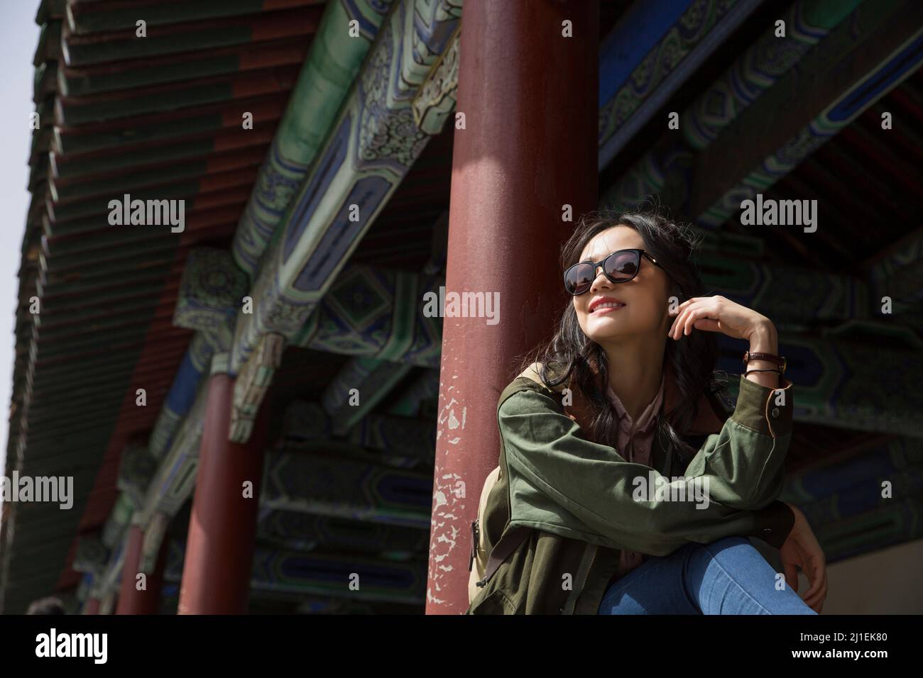 Female tourist resting in a pavilion in a classical park - stock photo Stock Photo