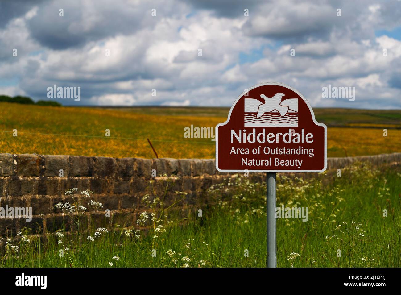 An information sign at the roadside telling motorists they are now entering Nidderdale an Area of Outstanding Natural Beauty. Stock Photo