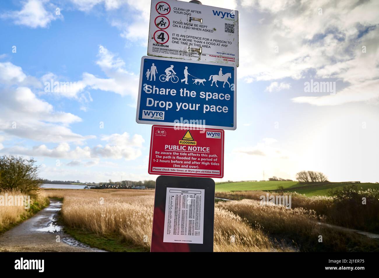Information signs including tide warnings on the River Wyre at Skippool,Lancashire,UK Stock Photo