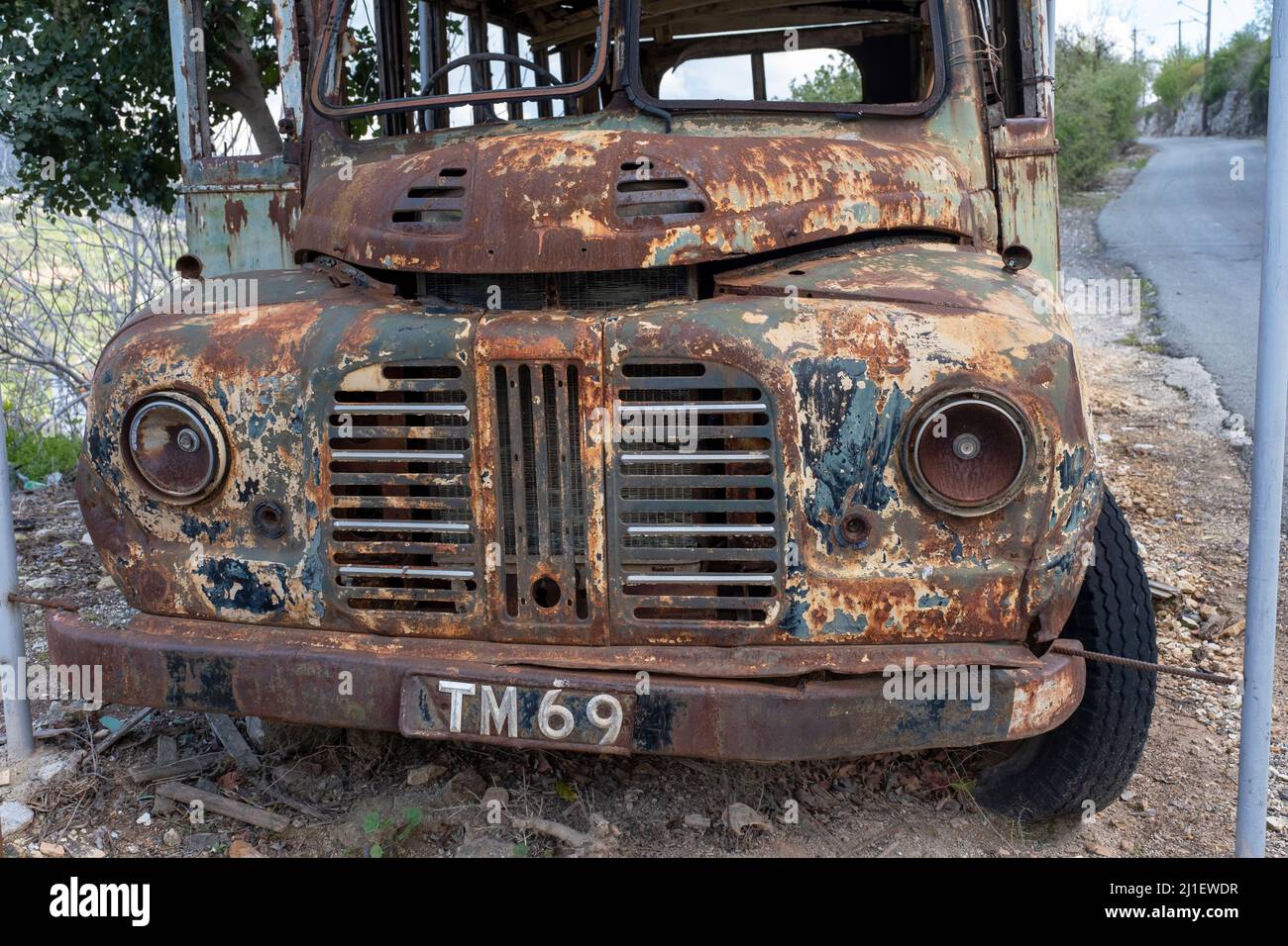 Abandoned bus on the roadside, Paphos region, Republic of Cyprus. Stock Photo