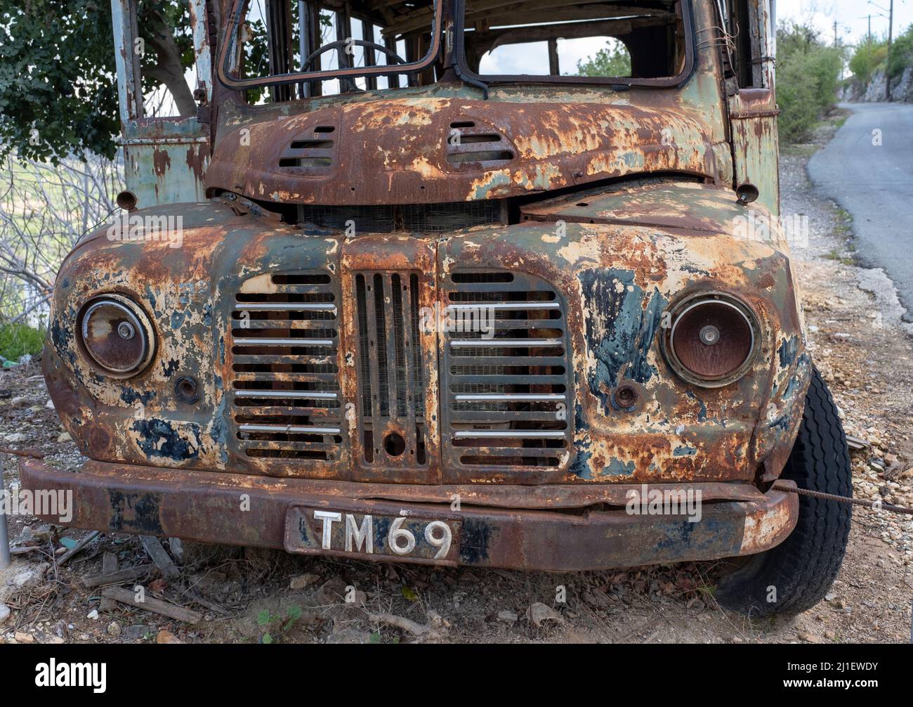 Abandoned bus on the roadside, Paphos region, Republic of Cyprus. Stock Photo