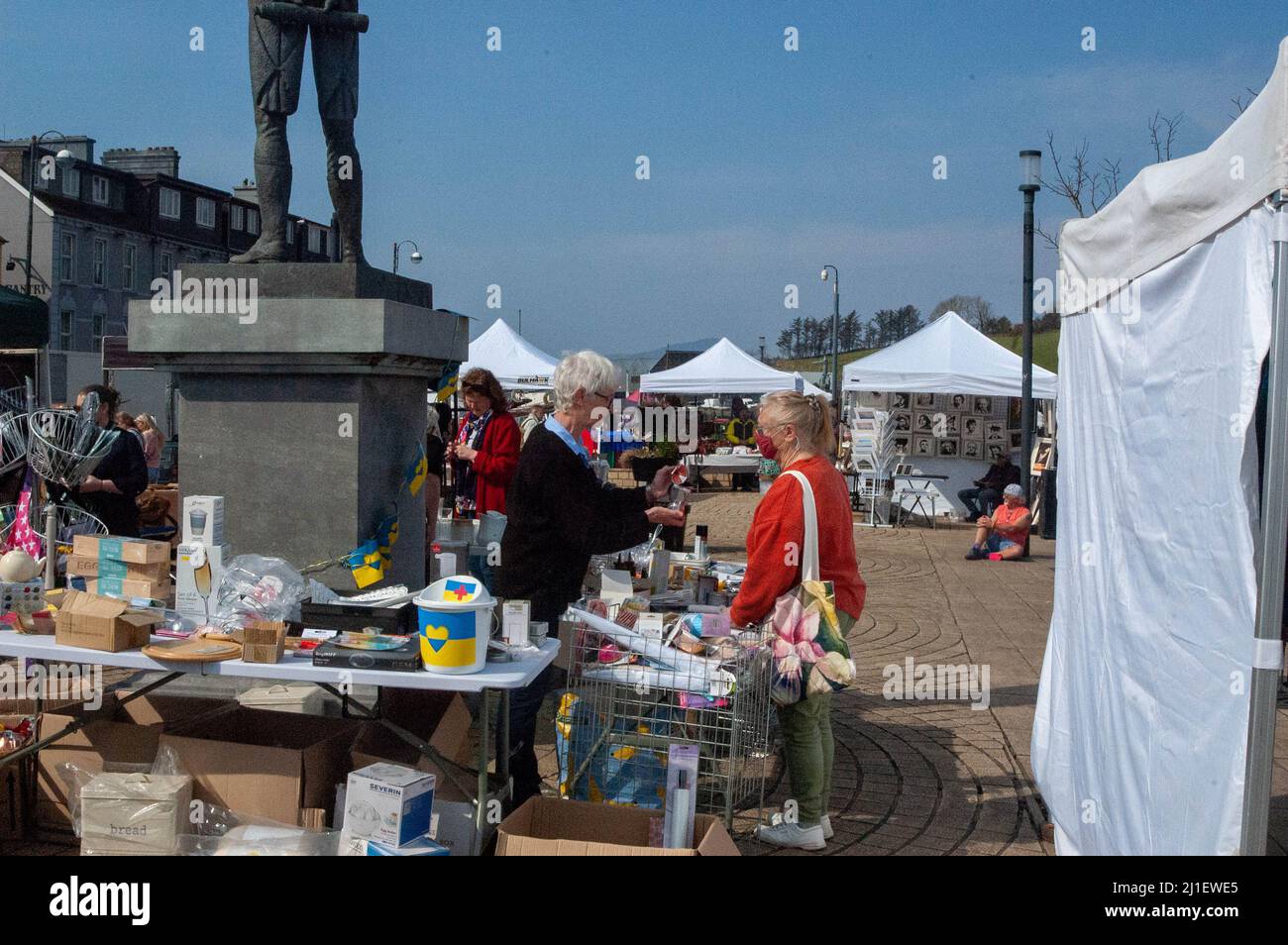 Bantry, West Cork, Ireland, Friday 25 Mar 2022; Maria Campbell, The cookware company, along with Her daughter in law Liz, selling cookware at a stall in Bantry Market. The ladies set up the stall to help The Irish Red Cross fund set up to help with the rehousing of Ukrainian refugees, fleeing their country due to the ongoing Russian invasion. Credit; ED/Alamy Live News Stock Photo