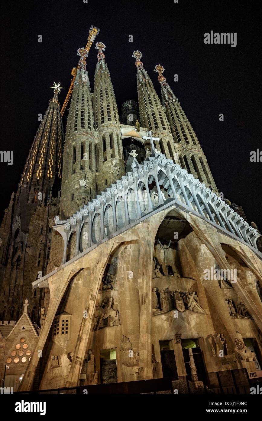 Passion Facade and the star of the Mary tower illuminated at night in the Sagrada Familia (Barcelona, Catalonia, Spain) ESP: Fachada de la Pasión Stock Photo