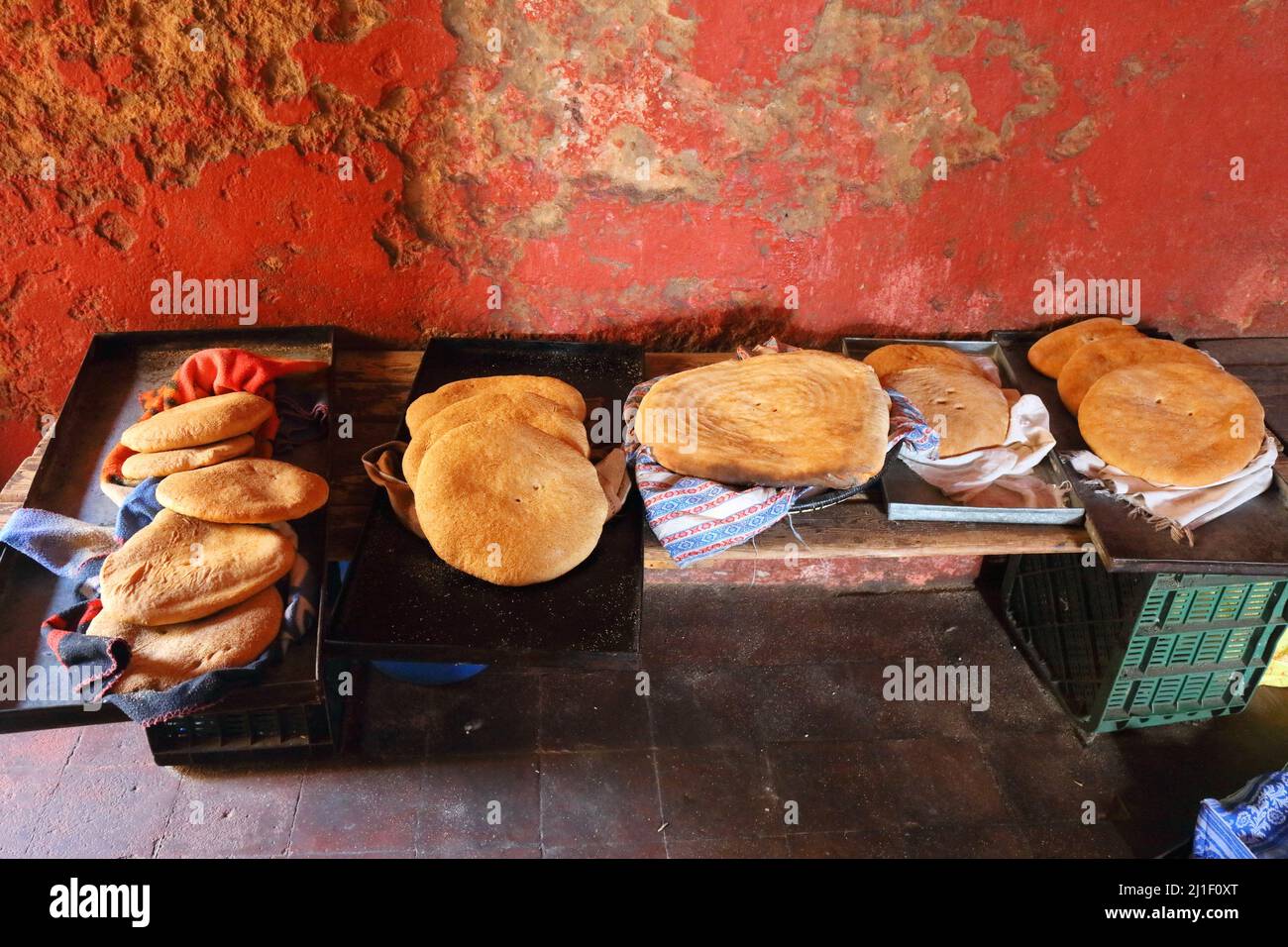 El Jadida town, Morocco. Fresh bread at famous public community bakery where people bring their own bread to have it baked. Stock Photo