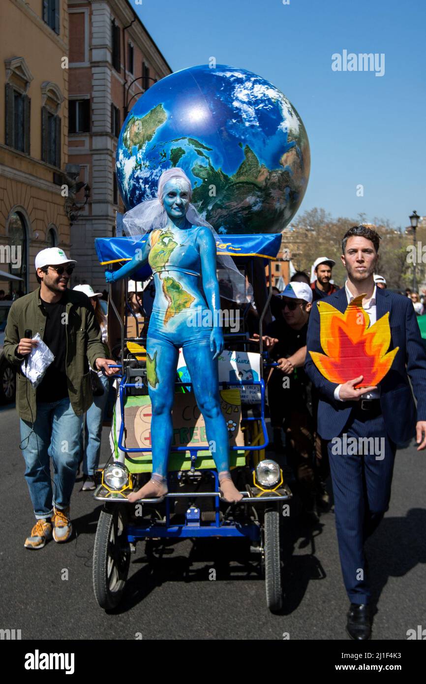 Rome, Italy. 25th Mar, 2022. Today, Fridays for Future Rome - supported by various other environmentalist organizations and movements - held a demonstration in central Rome called Global Strike For Climate. The aim of the rally was to call the Italian Government and all the world Governments, to act for an immediate plan, investments and policies against the so called climate changes and the consequent climate crisis. Stock Photo