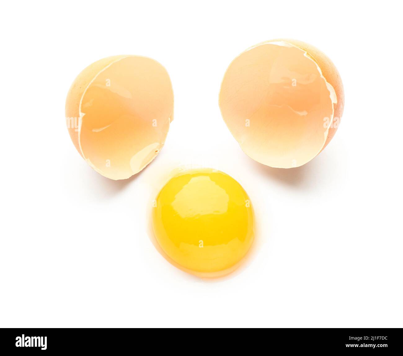Cracked chicken egg isolated on white background Stock Photo - Alamy